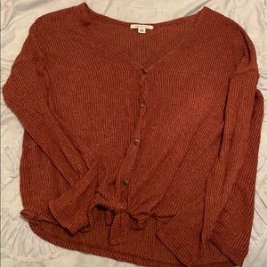 Dark red button up sweater